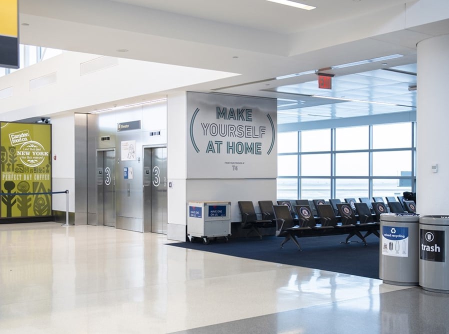 Terminal 4, Concourse B Departures and Arrivals. Major airlines include Delta, Emirates, Etihad, KLM, Singapore Air Media