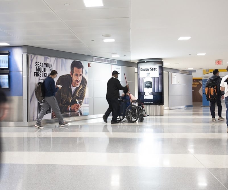 Terminal 8 Concourse C Departures and Arrivals. Major airlines include American, Cathay Pacific and Qatar. Media