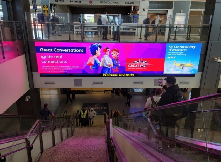 Domestic Arrivals Package of (2) Large Format Video Walls located above the highly trafficked arrivals escalators. Media