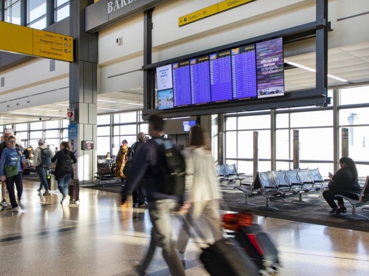 Arrivals & Departures Package of (9) LCDs mounted next to the Flight Information Display screens Media