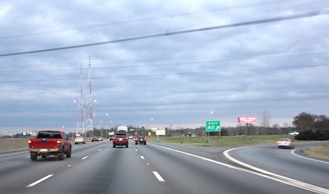 Viewed driving N. on I-85 near exit 40, Graham St., S/F Media