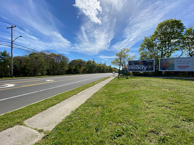 East Patchogue: north side Route 27A, 885' west of Orchard Rd., facing East Media