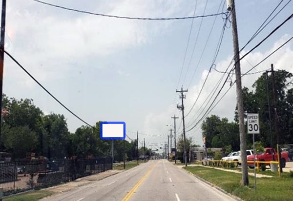 N Main St @ RR Tracks/ Baytown Media