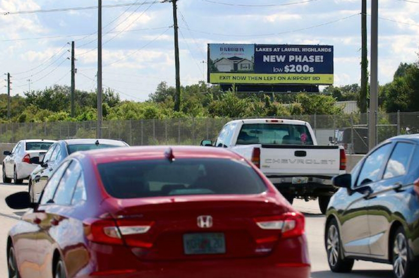 North side I-4 between exits Hwy 27 [Polk Parkway W] & 28 [Memorial Blvd/92]. ; RR ; E Media