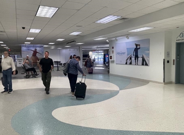 Captivating Tension Fabric Display in domestic baggage claim targeting all arrivals with checked luggage. Media