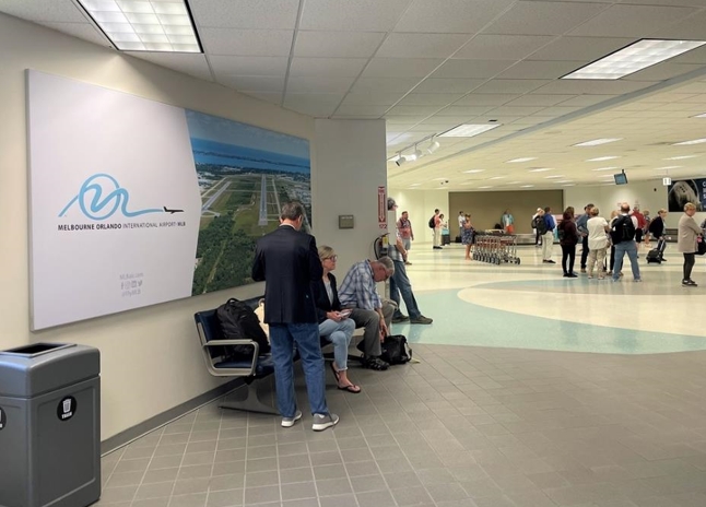 Captivating Tension Fabric Display in domestic baggage claim targeting all arrivals with checked luggage. Media