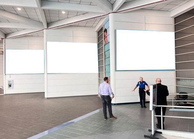 NO REAL ESTATE as per competitive separation agreement (to TFD-14). Prominent tension fabric display located in the lobby and will target domestic arrivals as they make their way to baggage claim and ground transportation. Media