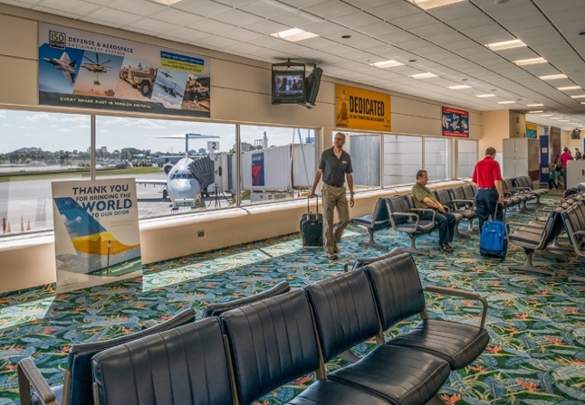 Notable Package of 2 Soffit Tension Fabric Displays in the concourse seen by domestic arrivals and departures. Media