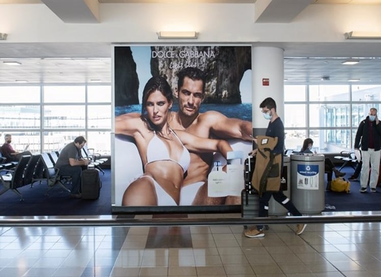 Terminal 4, Concourse B Departures and Arrivals. Major airlines include Delta, Emirates, Etihad, KLM, Singapore Air Media