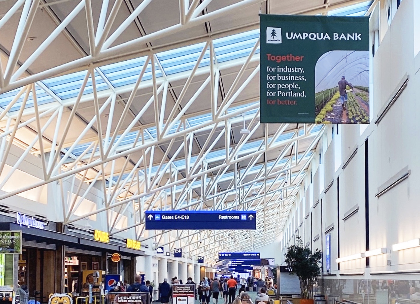 Moving Walkway Banners in Concourse E: Post-Security, hanging Media