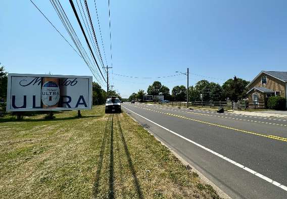 East Patchogue: south side Route 27A, 1500' west of Orchard Rd., facing east Media