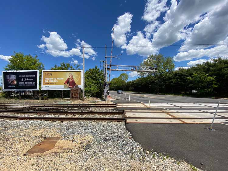 Bethpage: on Oyster Bay Rd at RR crossing next to Grumman, facing south Media